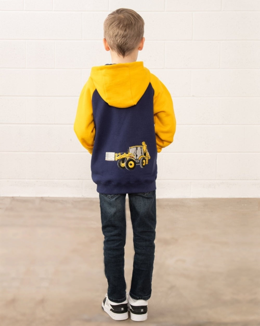 Navy JCB coloured Lighthouse Jackson Childrens Full Zip Hoodie on wall background