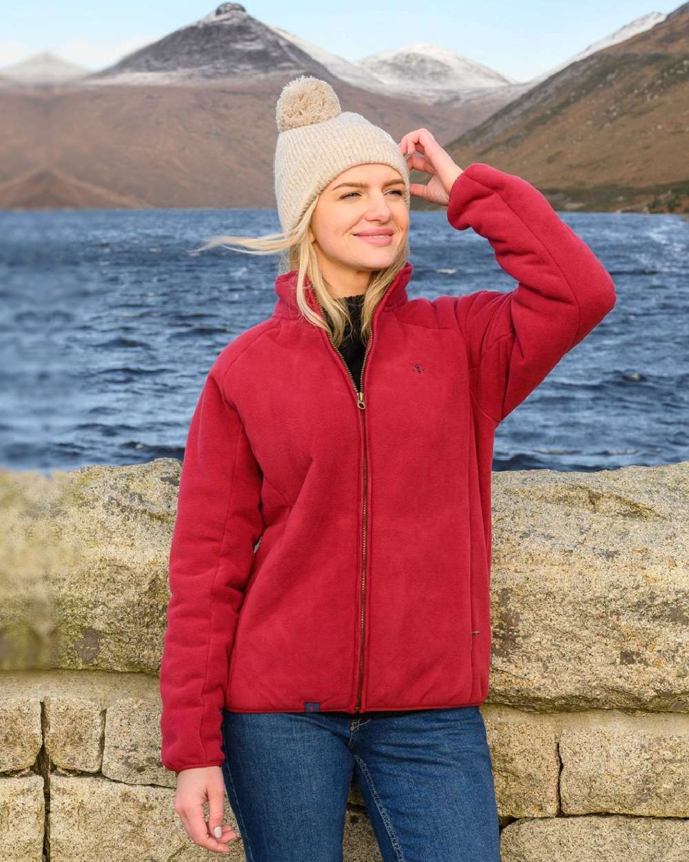 Maroon coloured Lighthouse Ladies Avon Waterproof Fleece on valley background