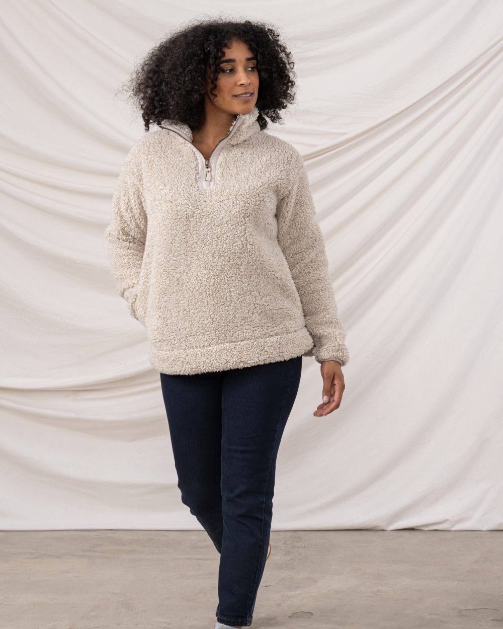 Irish Cream coloured Lighthouse Ladies Coast Half Zip Fleece Sweater on curtain background