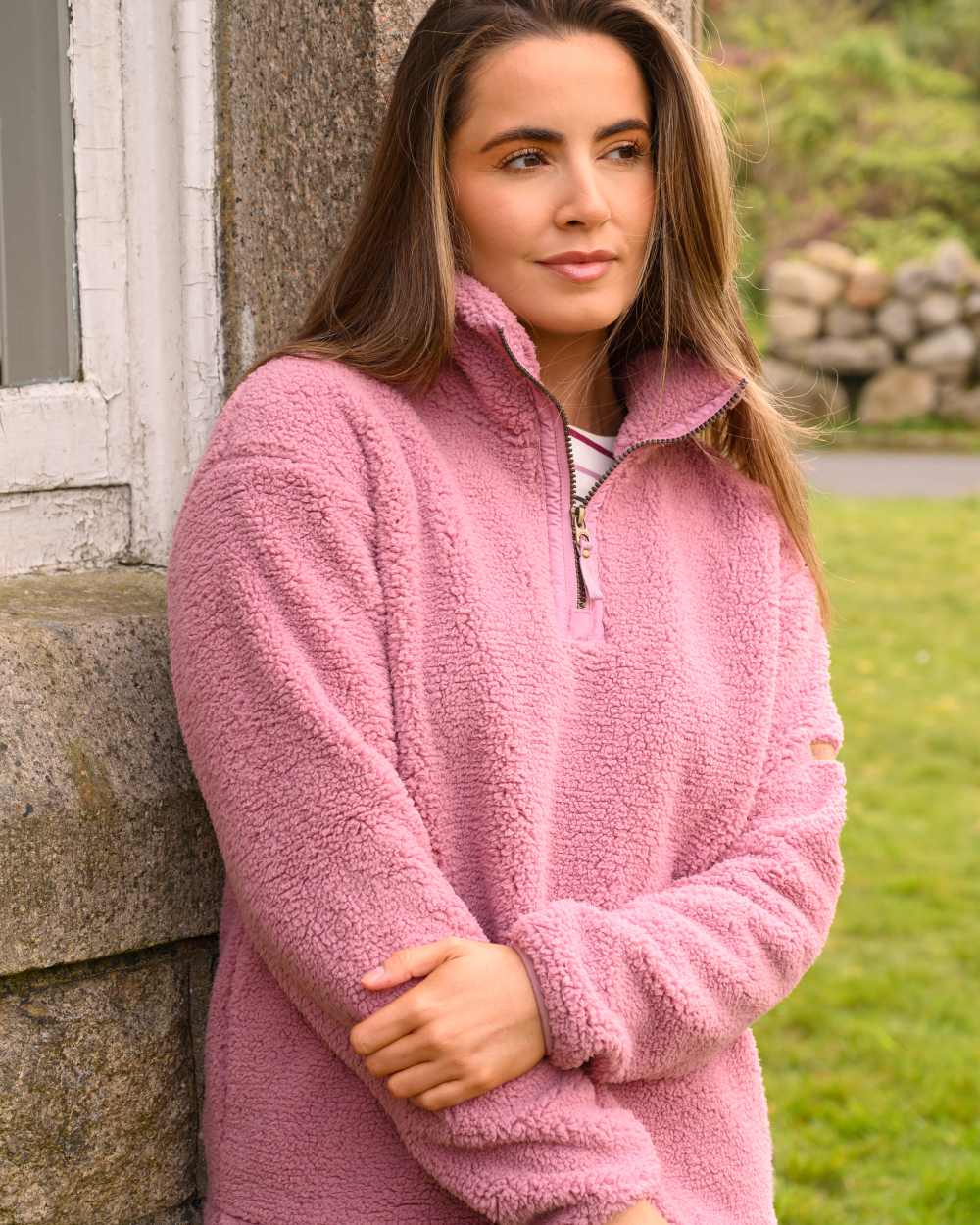 Wild Rose coloured Lighthouse Ladies Coast Half Zip Fleece Sweater on grassy background