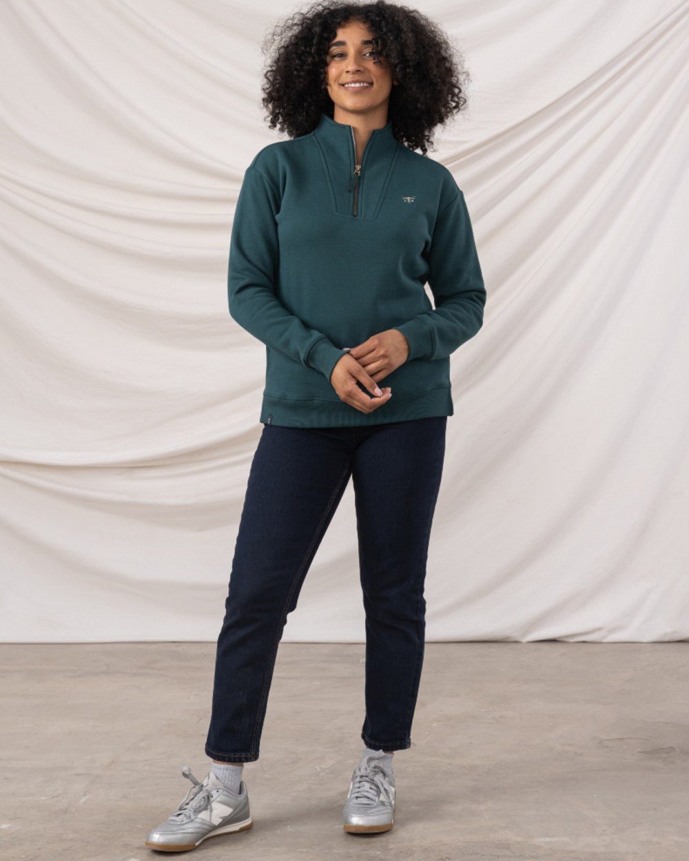 Pine coloured Lighthouse Ladies Coral Jersey on curtain background