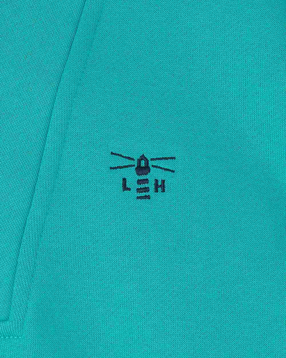 Soft Teal coloured Lighthouse Ladies Coral Jersey on white background