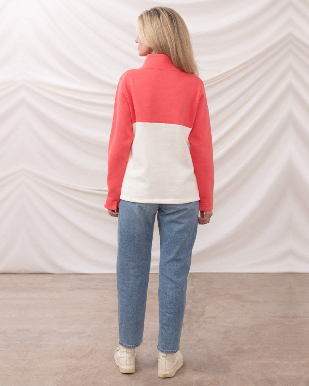 Coconut Deep Coral coloured Lighthouse Ladies Haven Jersey on curtain background