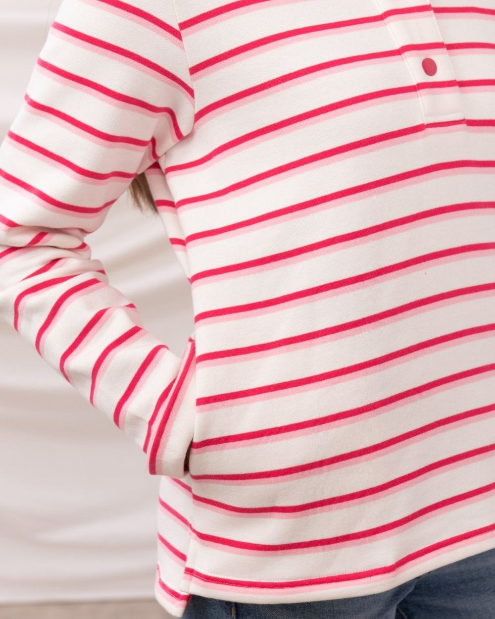 Pink Stripe coloured Lighthouse Ladies Haven Jersey on curtain background