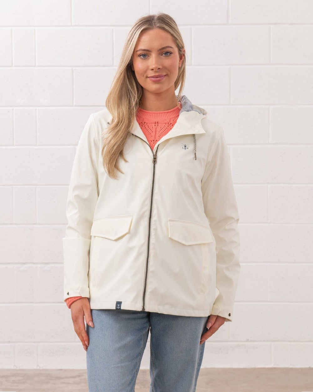 Coconut coloured Lighthouse Ladies Lucy Jacket on wall background