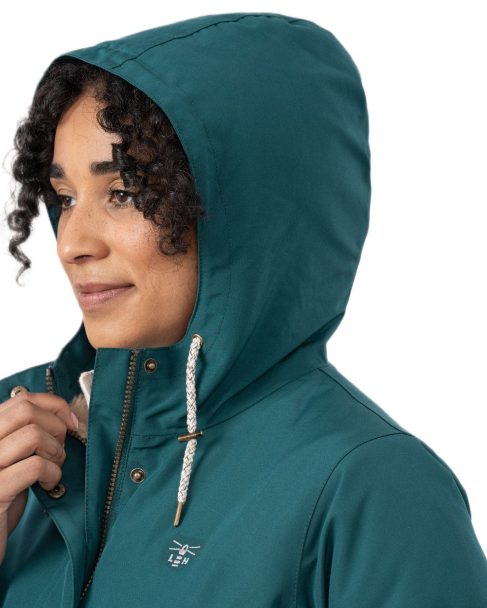 Pine coloured Lighthouse Ladies Scarlet Coat on wall background