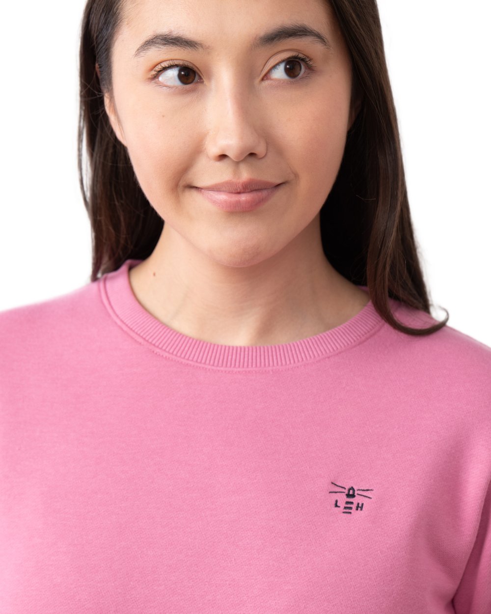 Pink coloured Lighthouse Ladies Seaside Jersey on white background