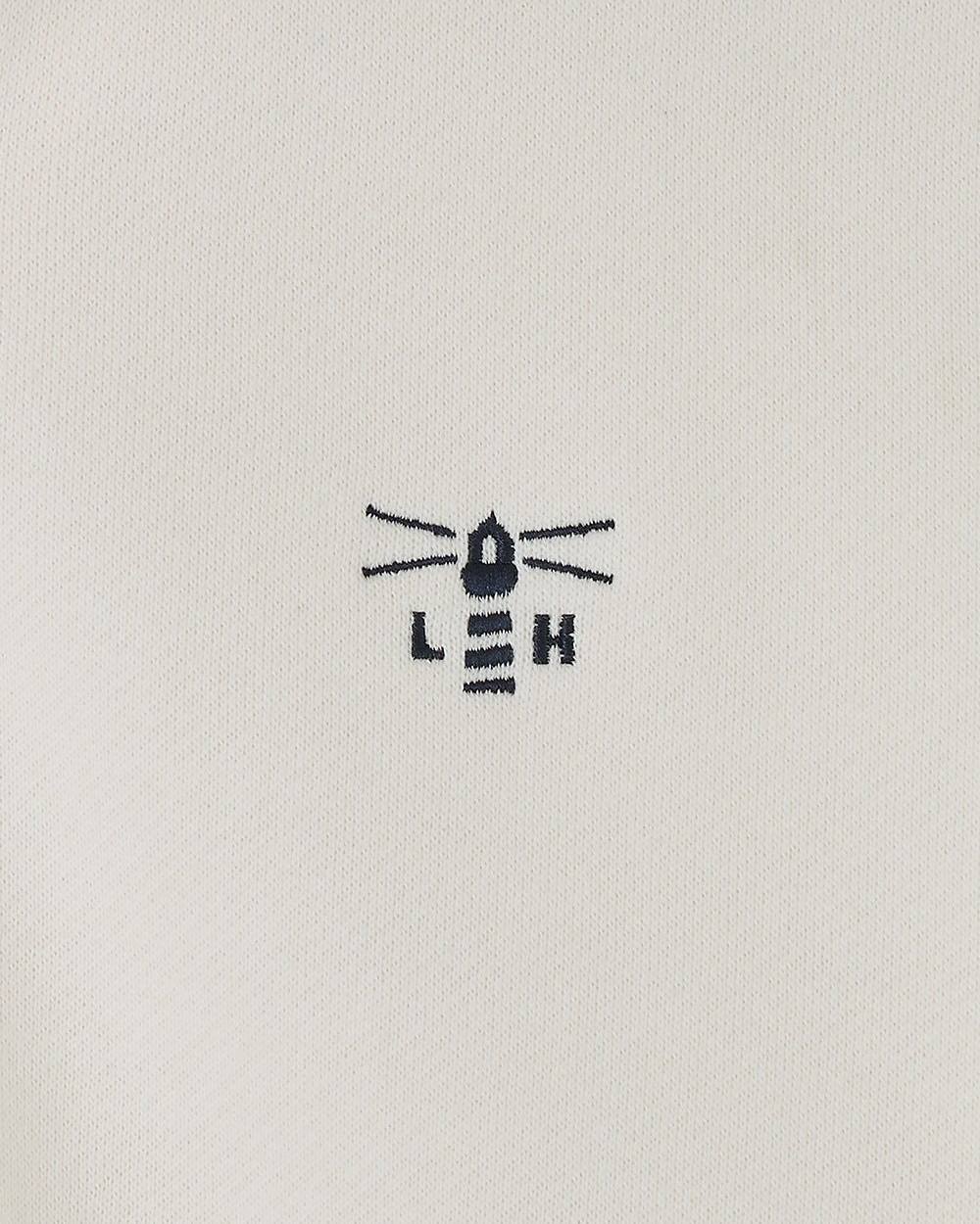 Coconut coloured Lighthouse Ladies Shore Sweatshirt on white background