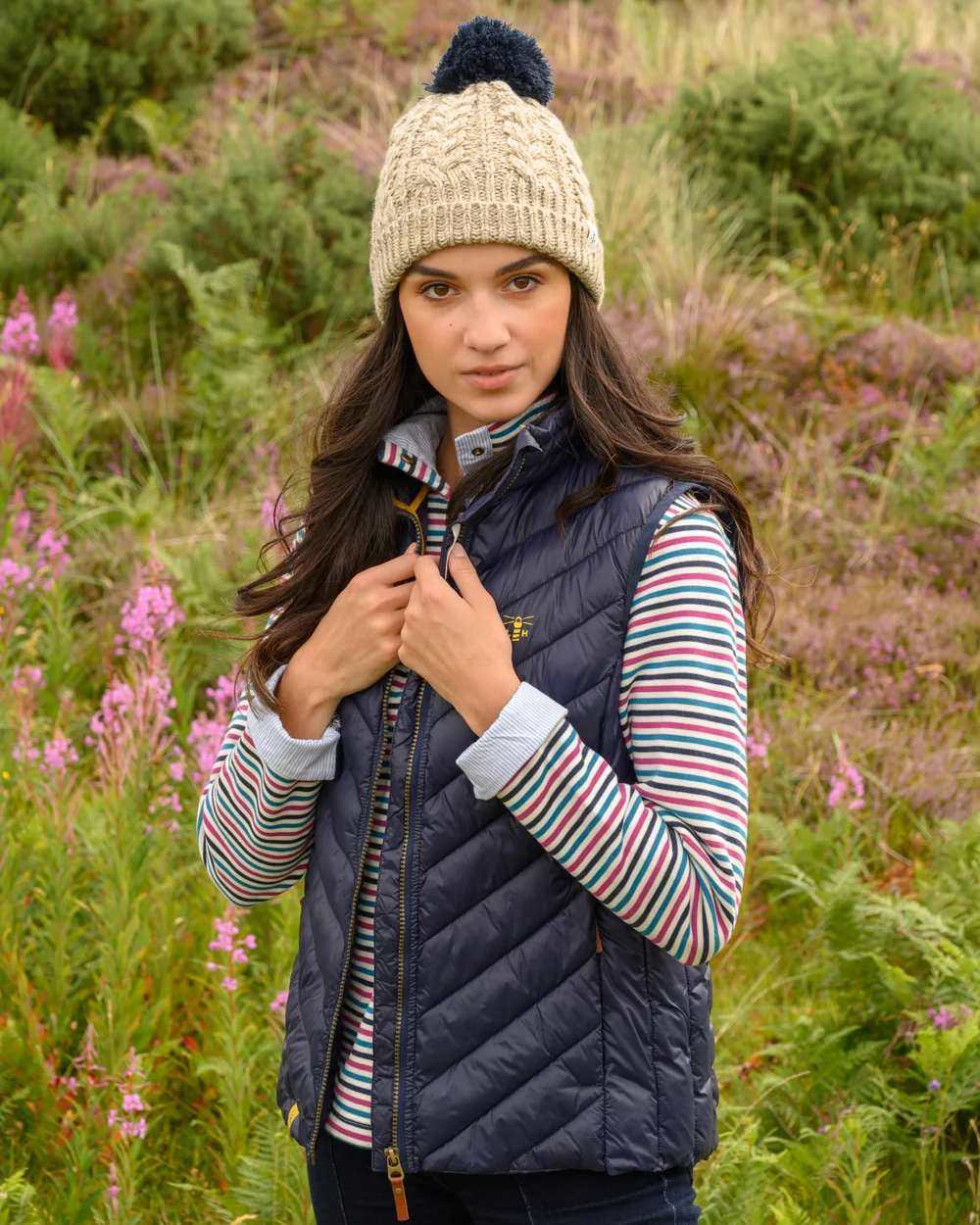 Navy coloured Lighthouse Laurel Ladies Gilet on meadow background