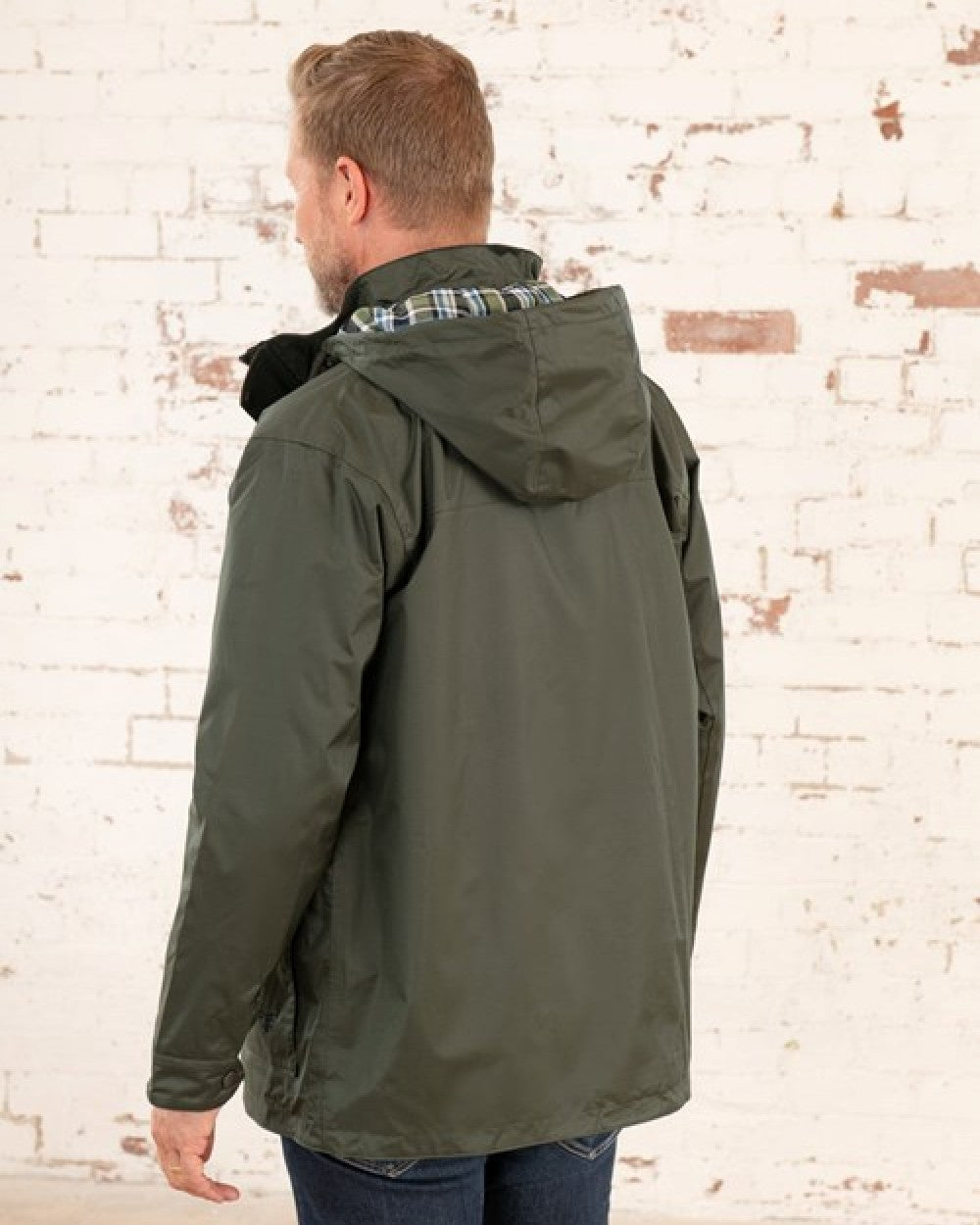 Hunter Green Coloured Lighthouse Mens Oxford Raincoat on wall background