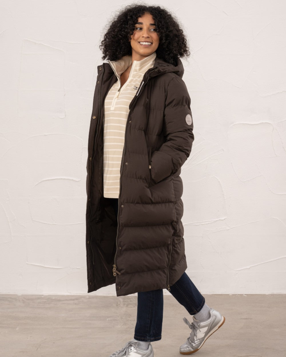 Cocoa coloured Lighthouse Savannah Coat on wall background