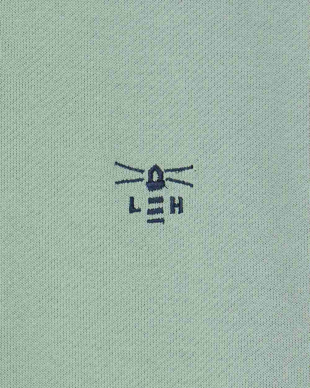 Sage coloured Lighthouse Shore Jersey Top on white background