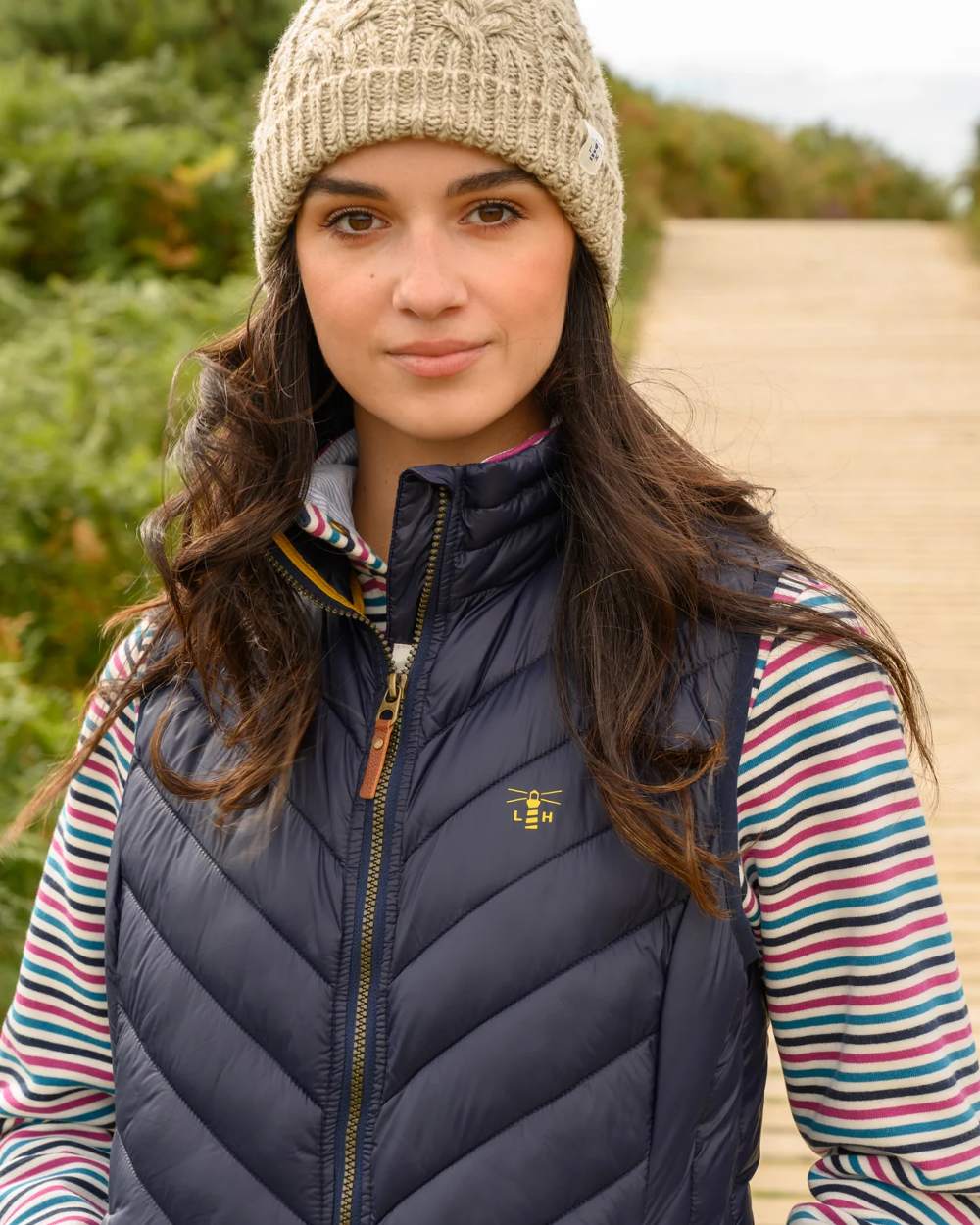 Navy coloured Lighthouse Laurel Ladies Gilet on street background