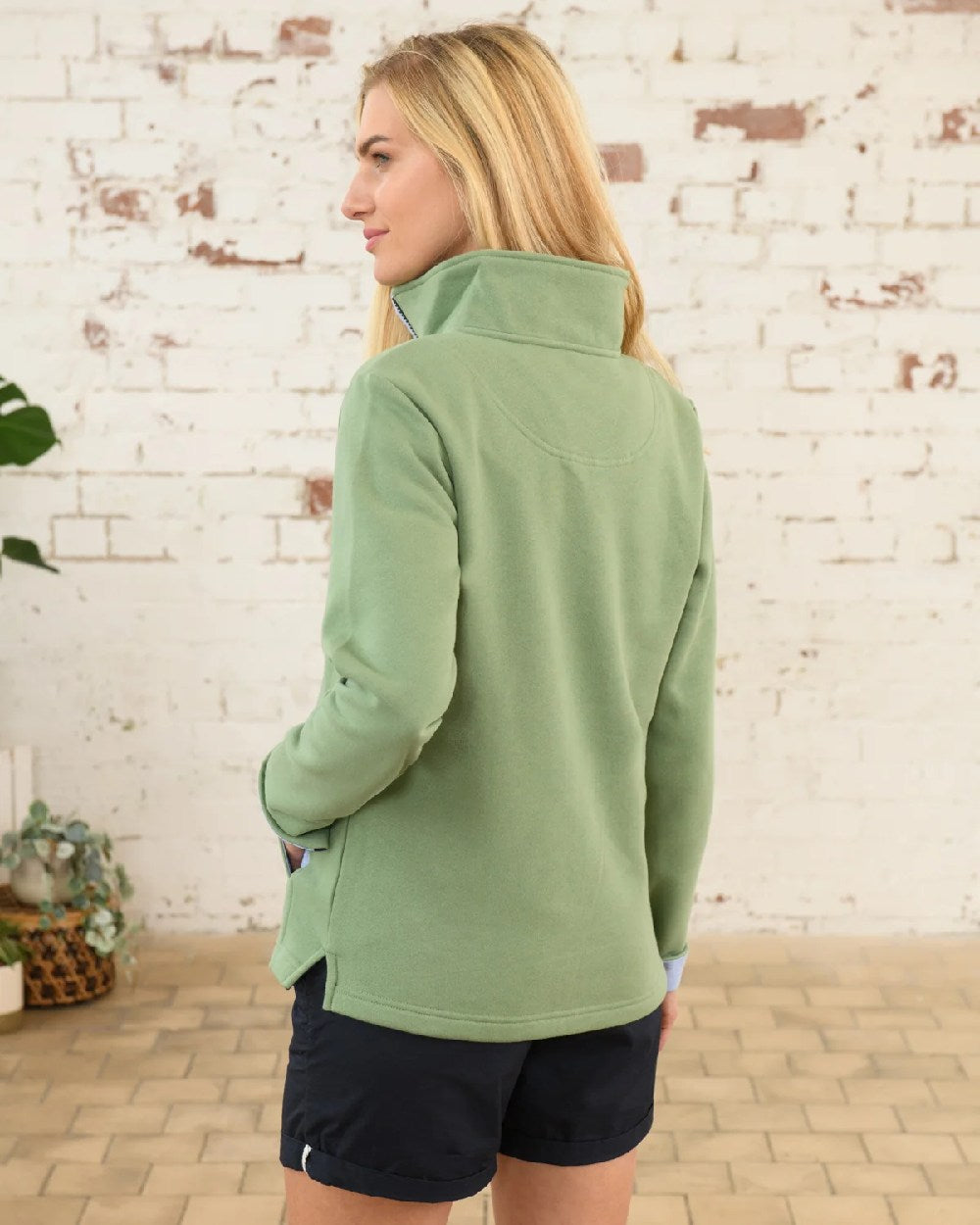 Pistachio coloured Lighthouse Shore Jersey Top on wall background