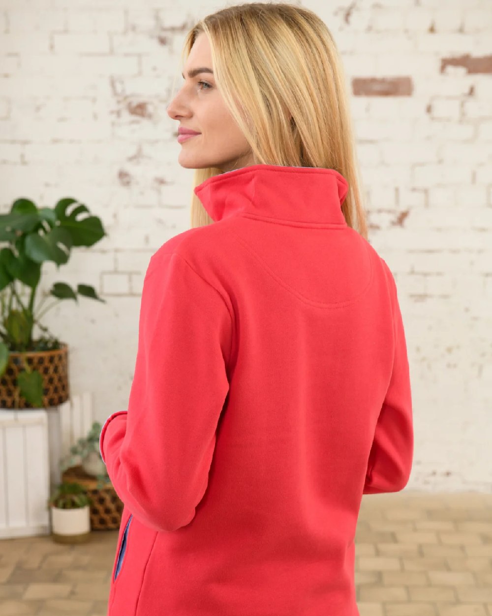 Watermelon coloured Lighthouse Shore Jersey Top on wall background