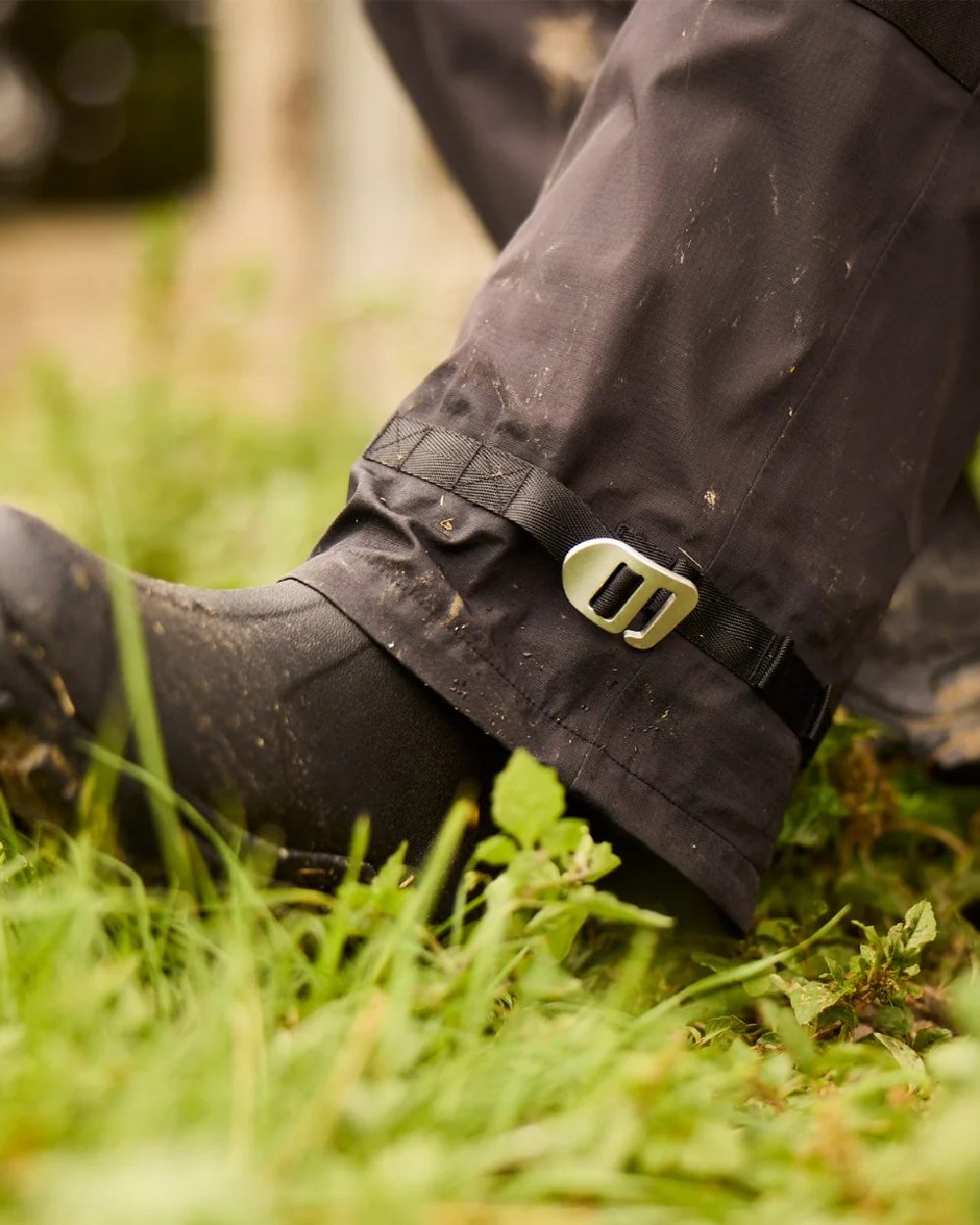 Black Coloured Line 7 Womens Territory Storm Pro20 Waterproof Bib Overtrouser on ground background