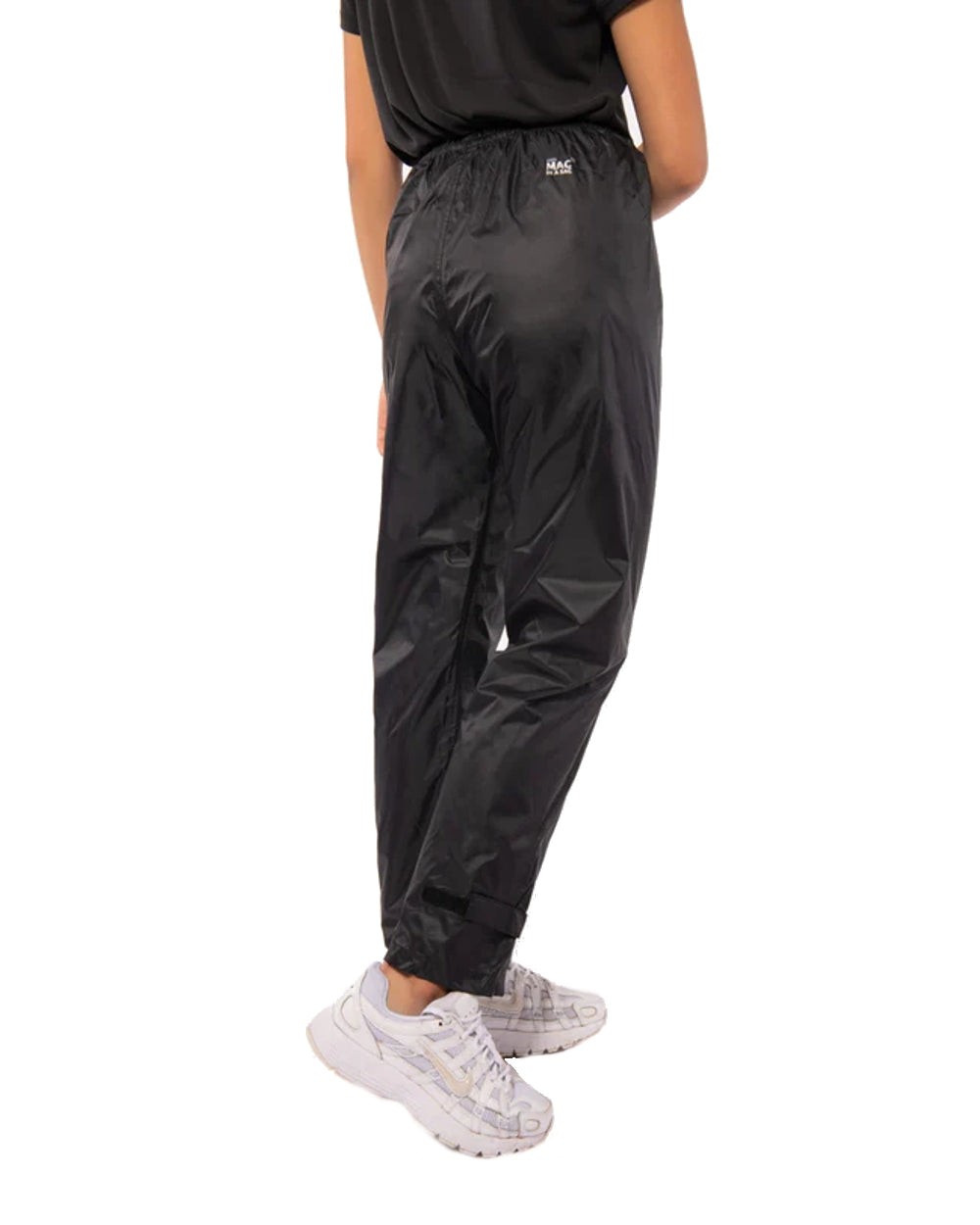 Black coloured Mac In A Sac Origin 2 Childrens Overtrousers on white background