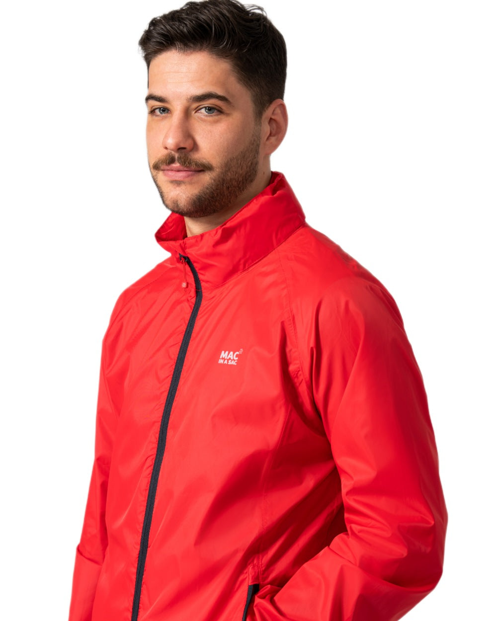 Red coloured Mac In A Sac Packable Origin Waterproof Jacket on white background