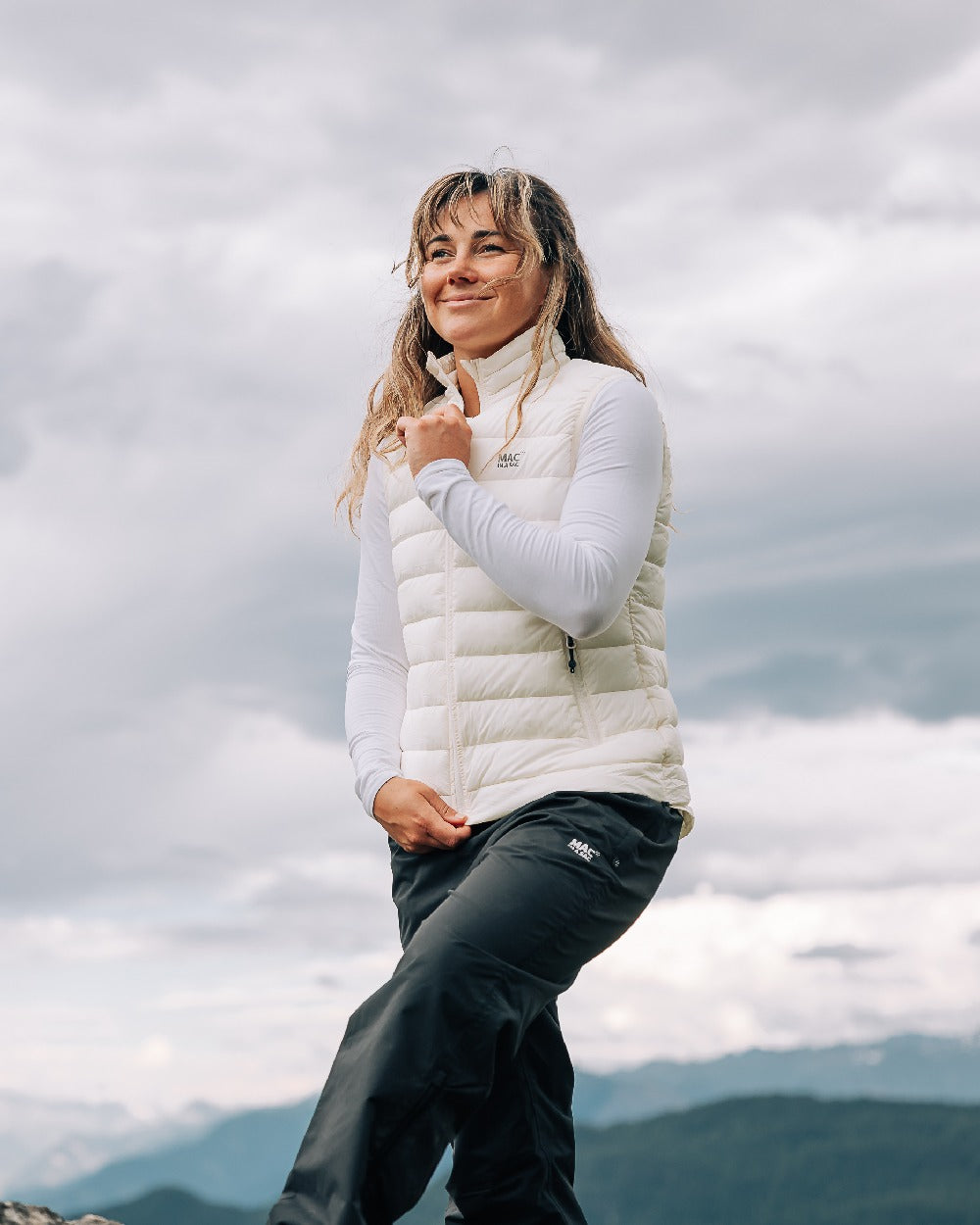Ivory Coloured Mac In A Sac Womens Synergy Gilet on sky background