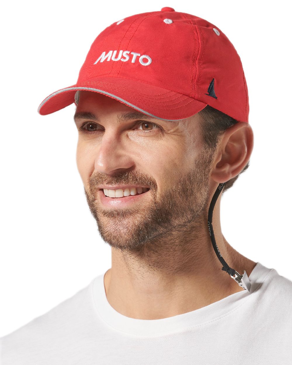 True Red coloured Musto Essential Fast Dry Crew Cap on white background
