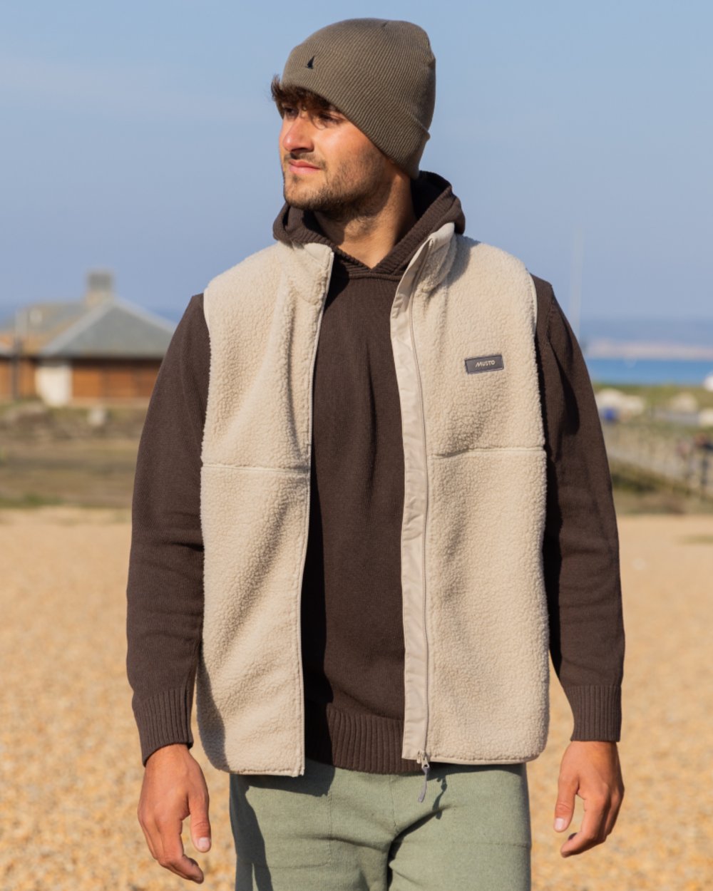 Pure Cashmere coloured Musto Mens Cover Deep Pile Fleece Vest on outdoor background