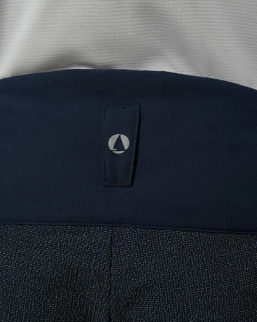True Navy Coloured Musto Mens Evo Performance Stretch Shorts on studio background