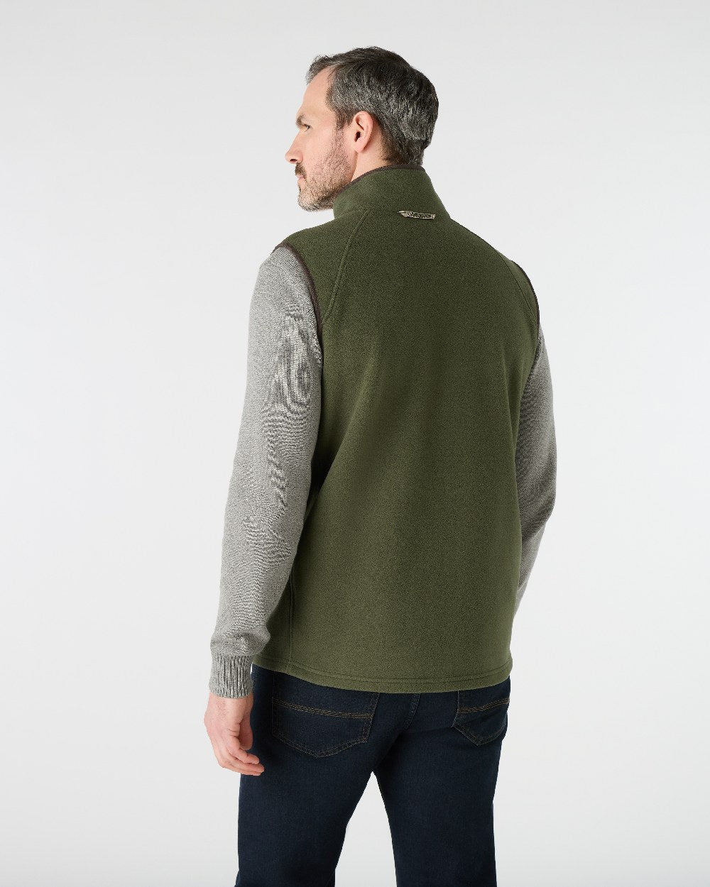Deep Green Coloured Musto Mens Fenland 200 Polartec Vest on White Background