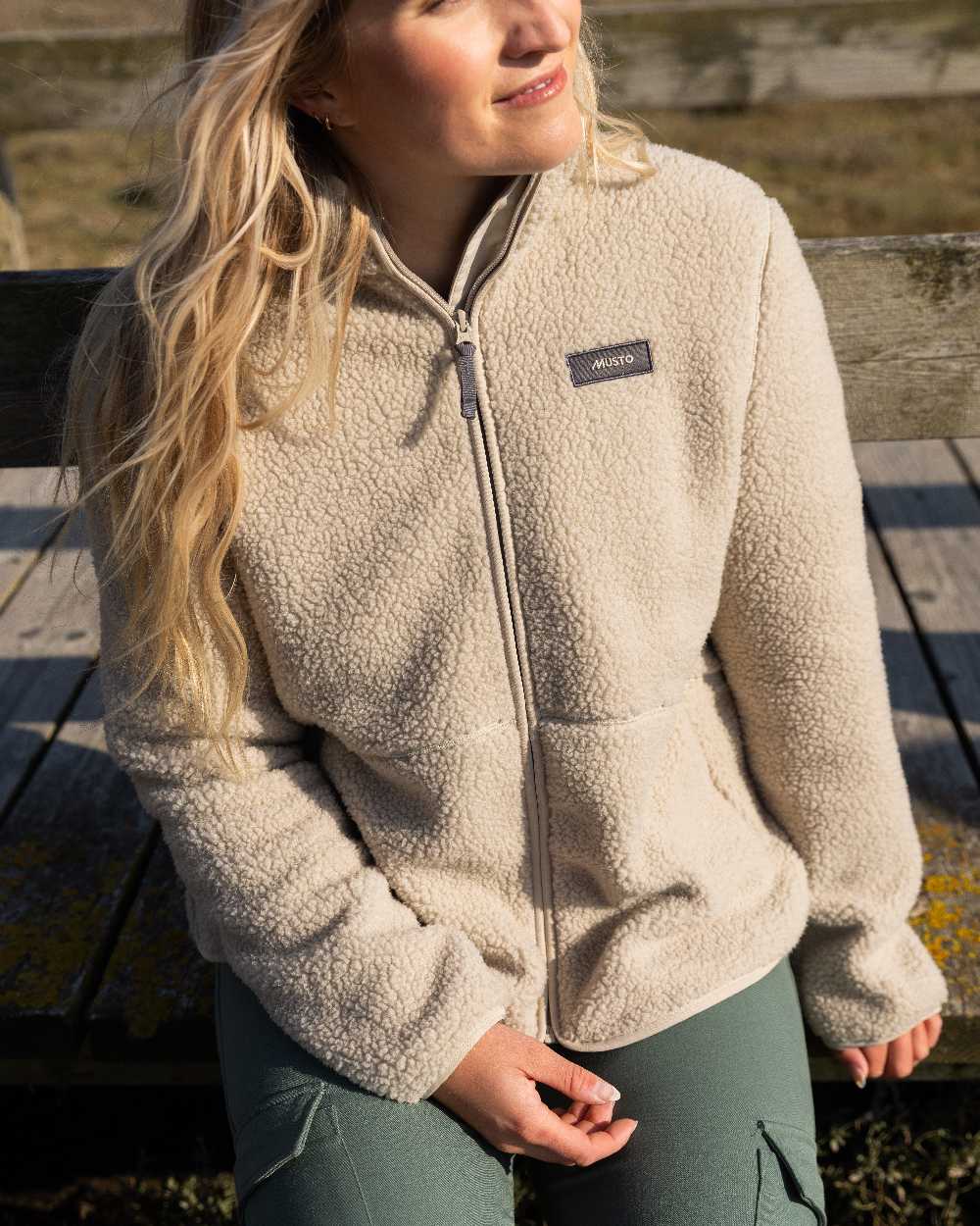 Pure Cashmere Coloured Musto Womens Cover Deep Pile Fleece Jacket on outdoor background