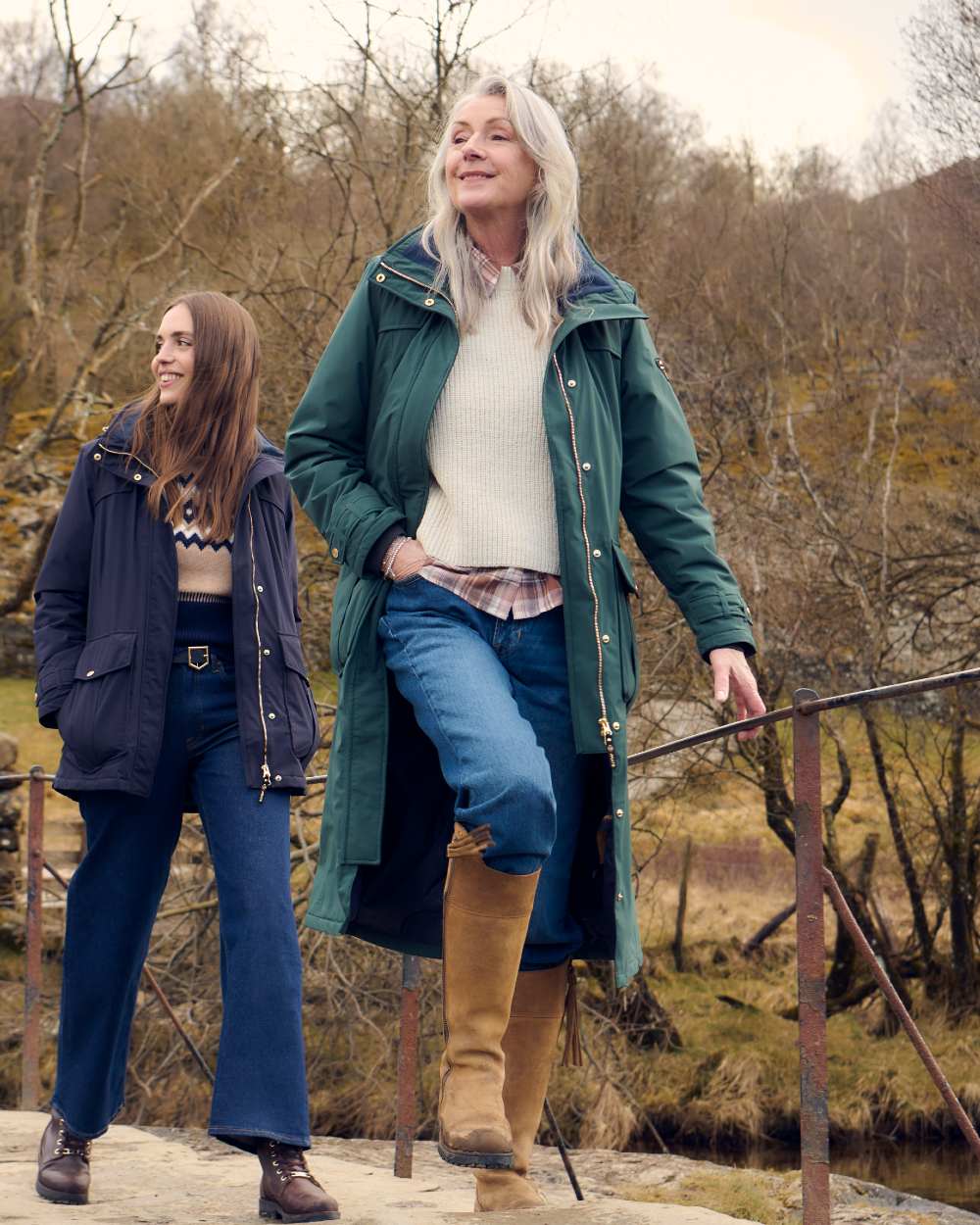 Darkest Spruce Coloured Musto Womens Odyssey Waterproof Coat on outdoor background