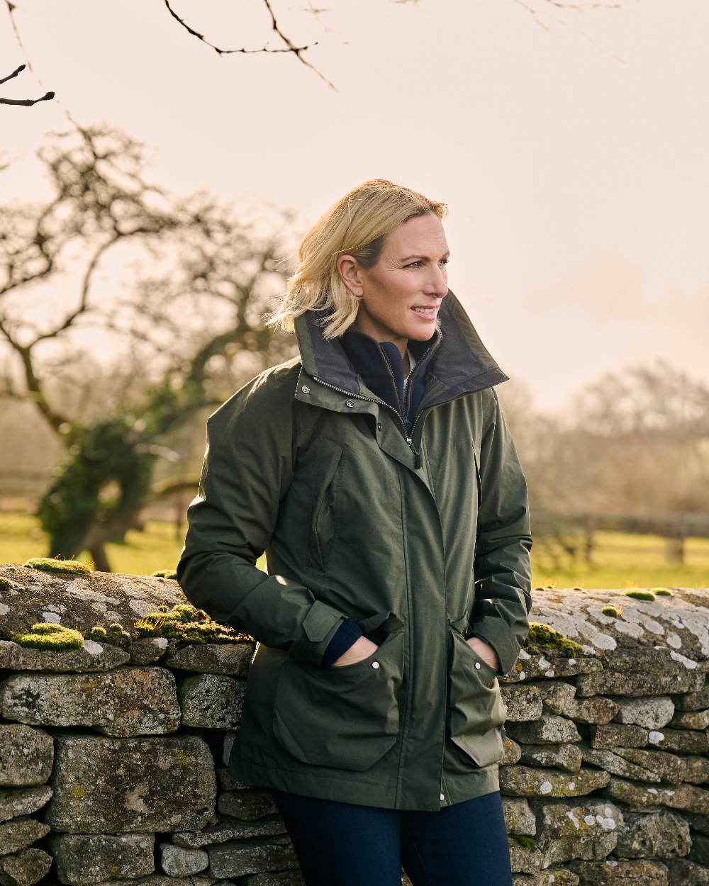 Deep Green Coloured Musto Womens Fenland Jacket 3.0 on Outdoor Background