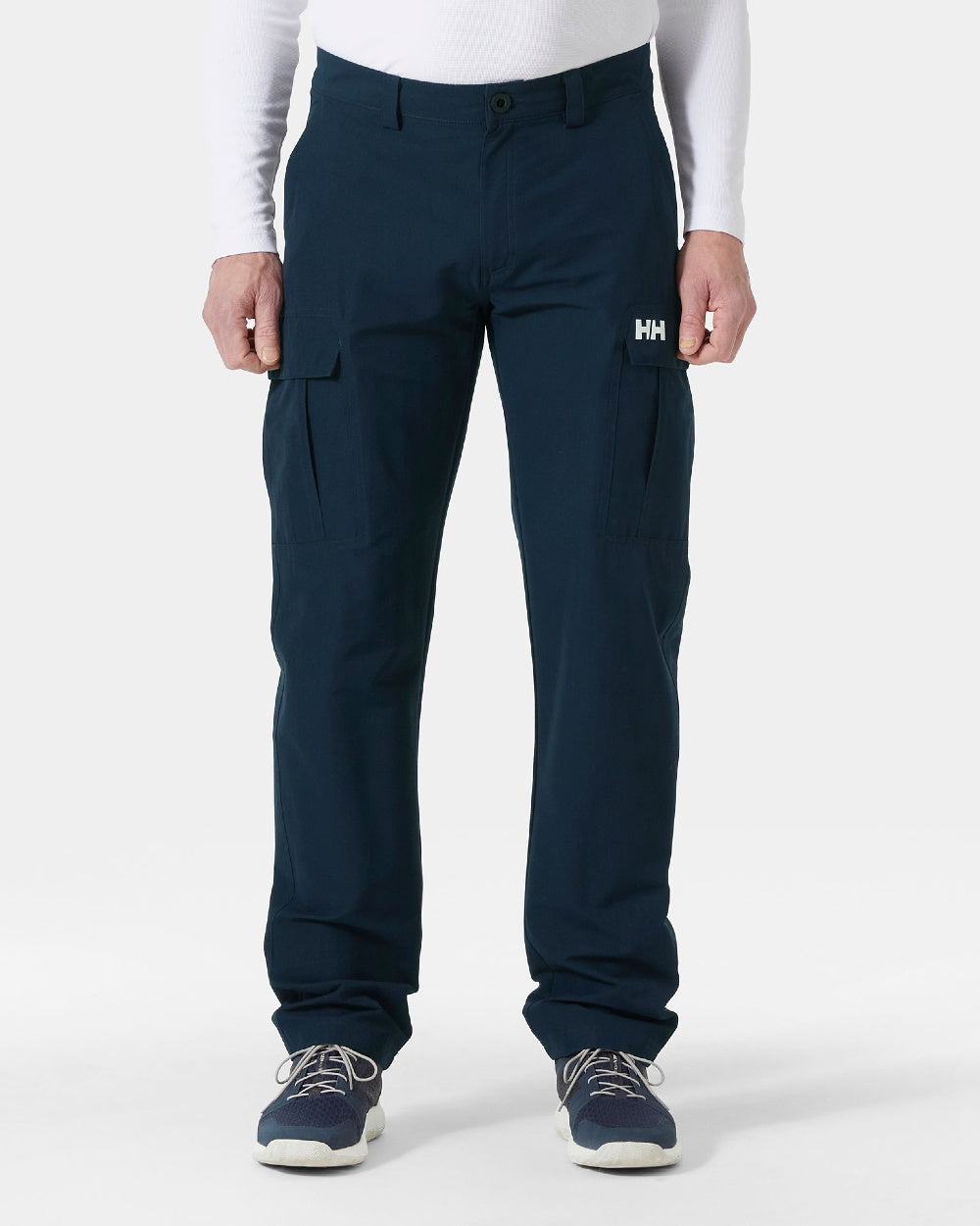 Navy coloured Helly Hansen Mens HH quick dry cargo pant on grey background
