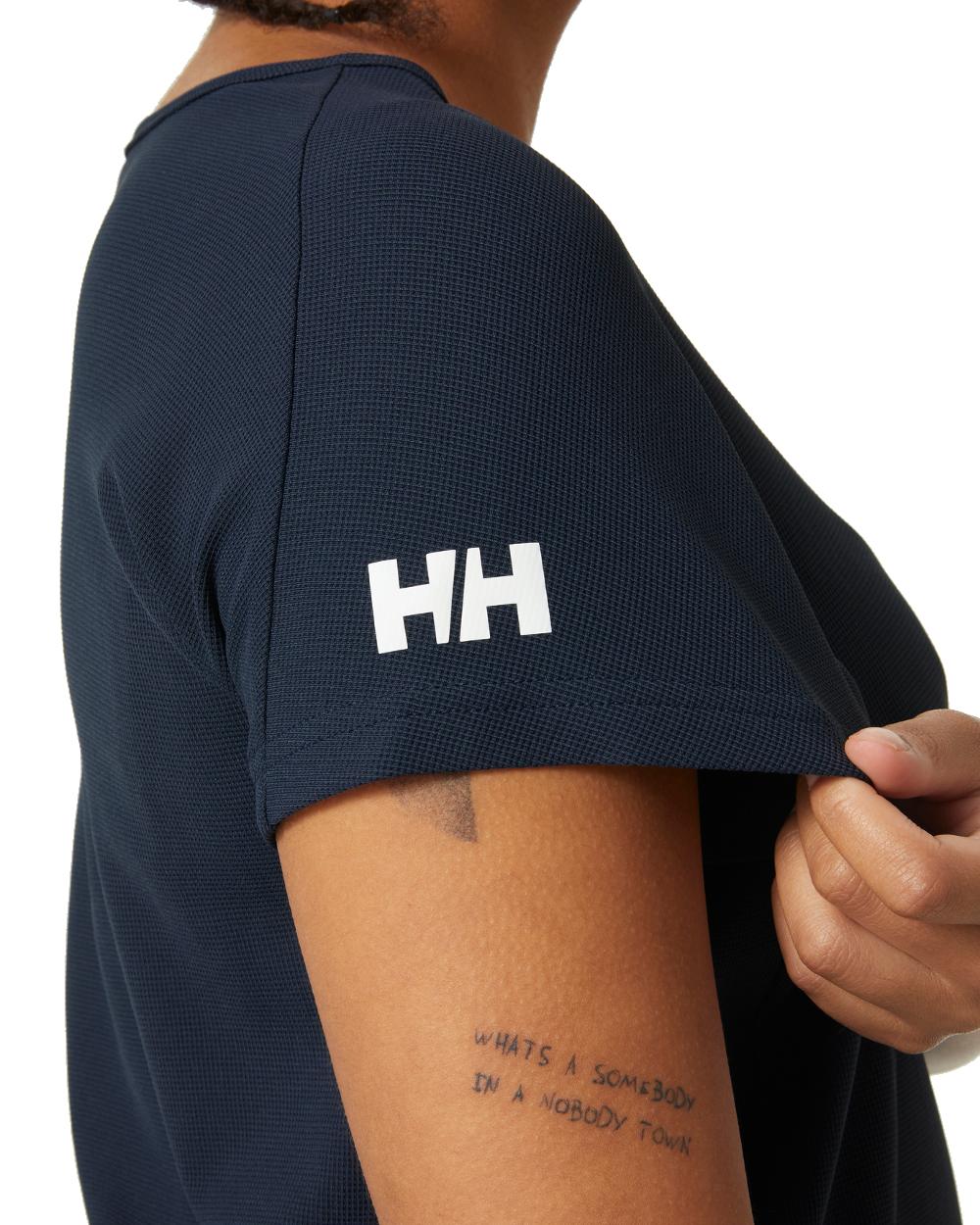 Navy coloured Helly Hansen womens crewline quick dry top on white background