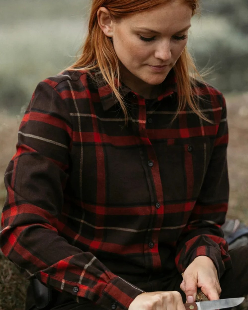 Orange coloured Northern Hunting Womens Alba Cotton Shirt on blurry background