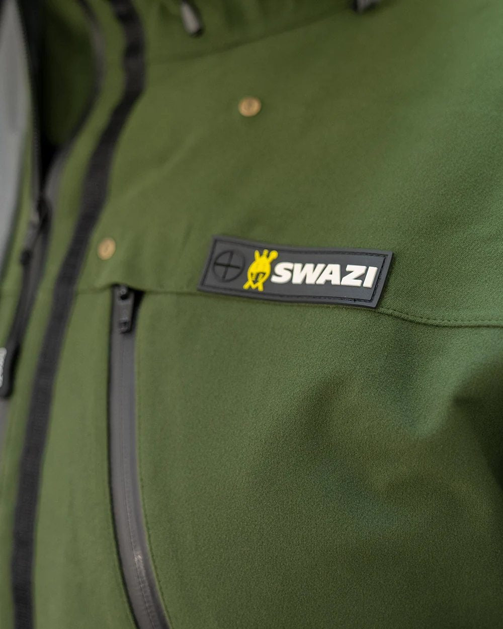 Olive Coloured Swazi Kagoule Jacket On A White Background