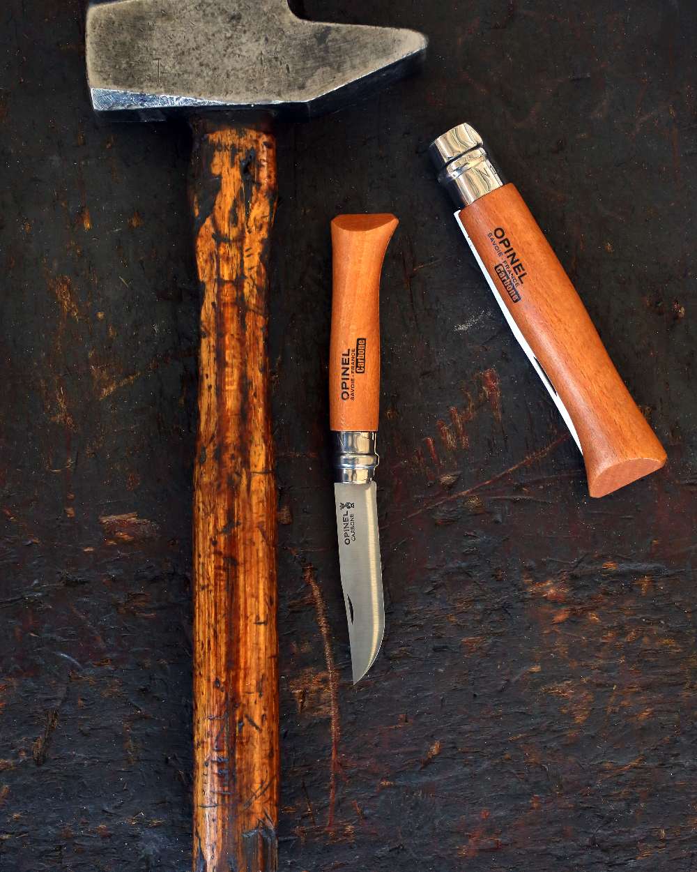 Carbon Steel coloured Opinel Classic Originals Non-Locking Knife on rock background