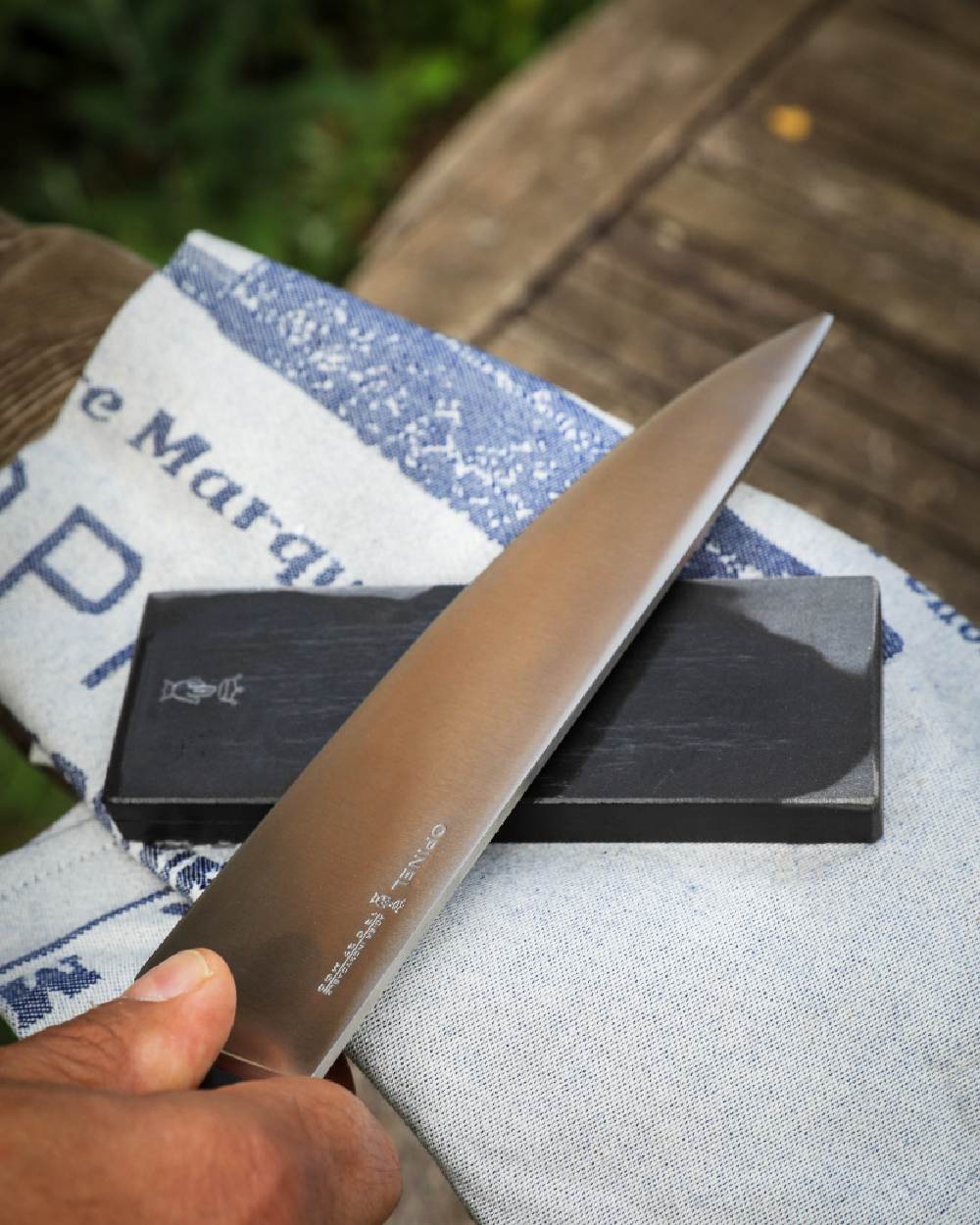 14cm Opinel Sharpening Stone on forest background