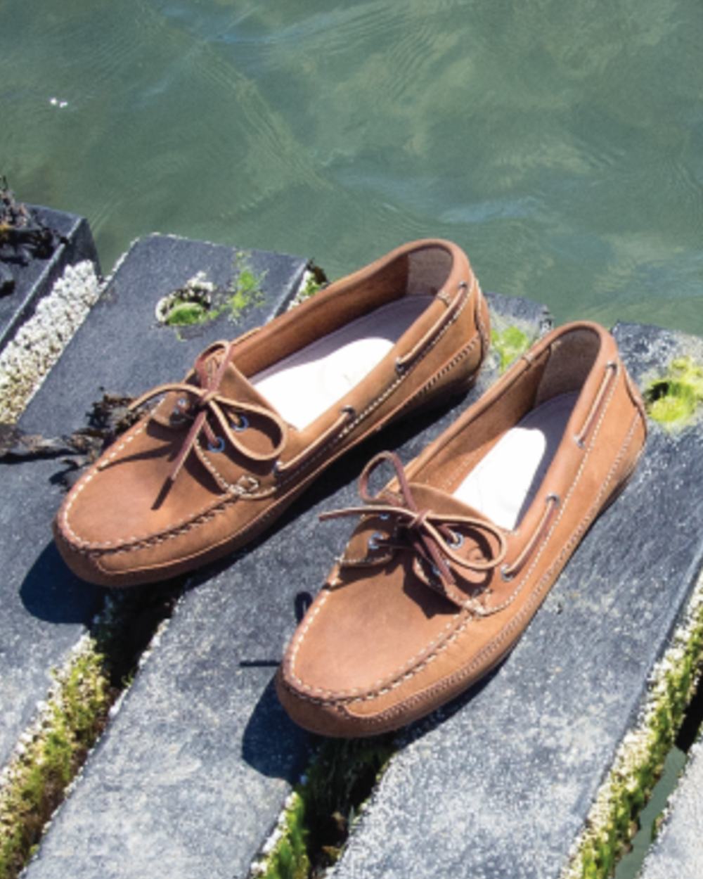 Sand Coloured Orca Bay Augusta Mens Deck Shoes On A Sea Background