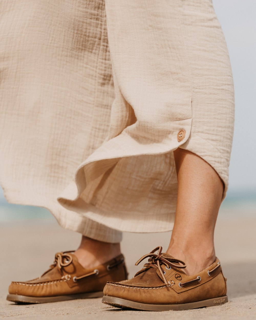 Havana Coloured Orca Bay Creek Womens Deck Shoes On A Sand Background