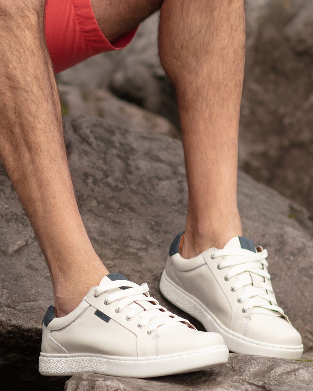 White Navy Coloured Orca Bay Mens Belgravia Trainers on outdoor background
