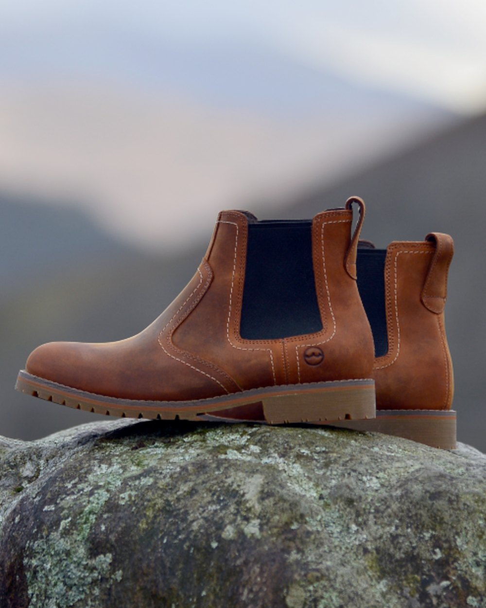 Havana Coloured Orca Bay Mens Exmoor Chelsea Boots On A mountain Background