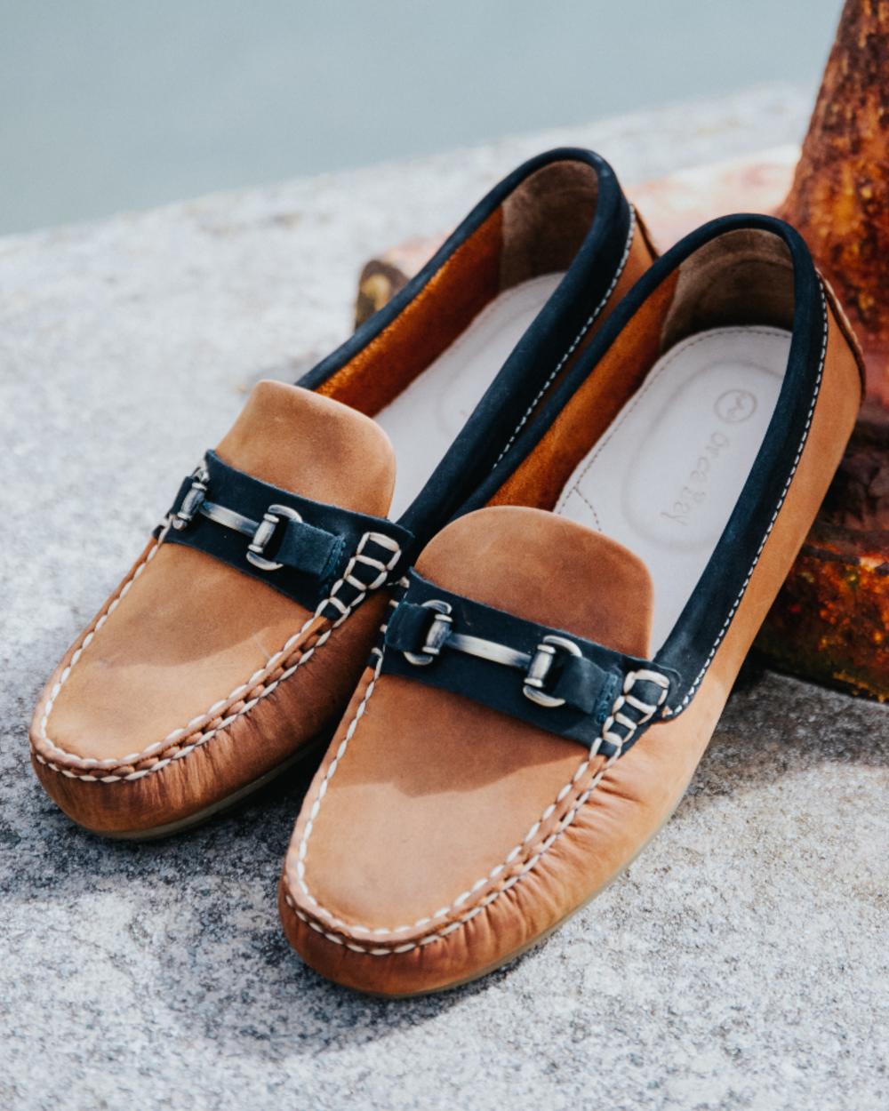 Sand Navy Coloured Orca Bay Verona Womens Loafers On A Lake Background