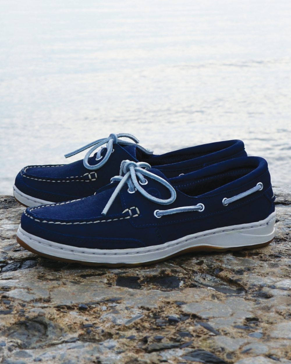 Indigo Coloured Orca Bay Womens Lagoon Sports Shoes on sea background