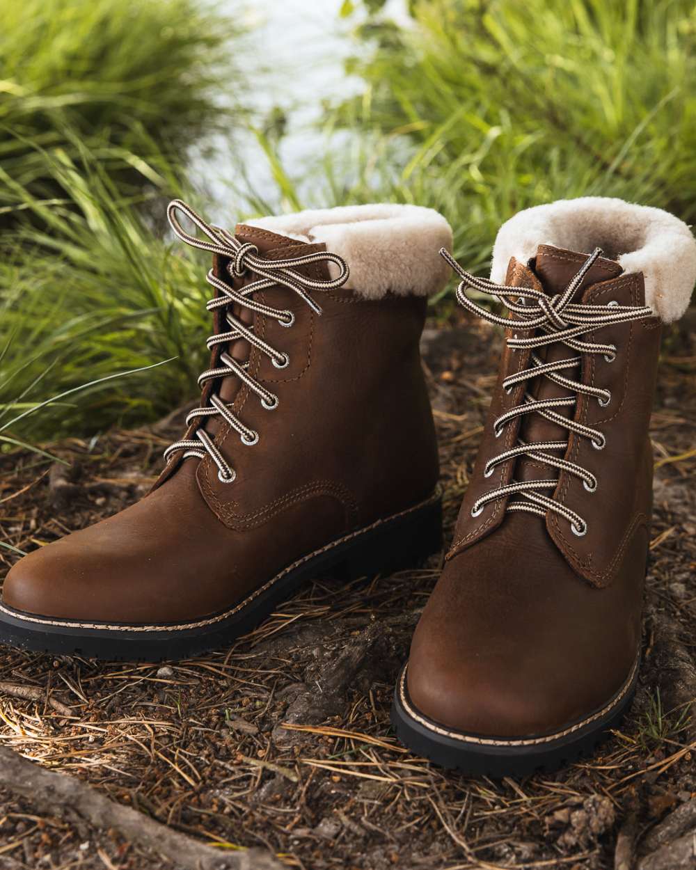 Brown coloured Orca Bay Womens Real Sheepskin Lining Pennine Boots on outdoor background