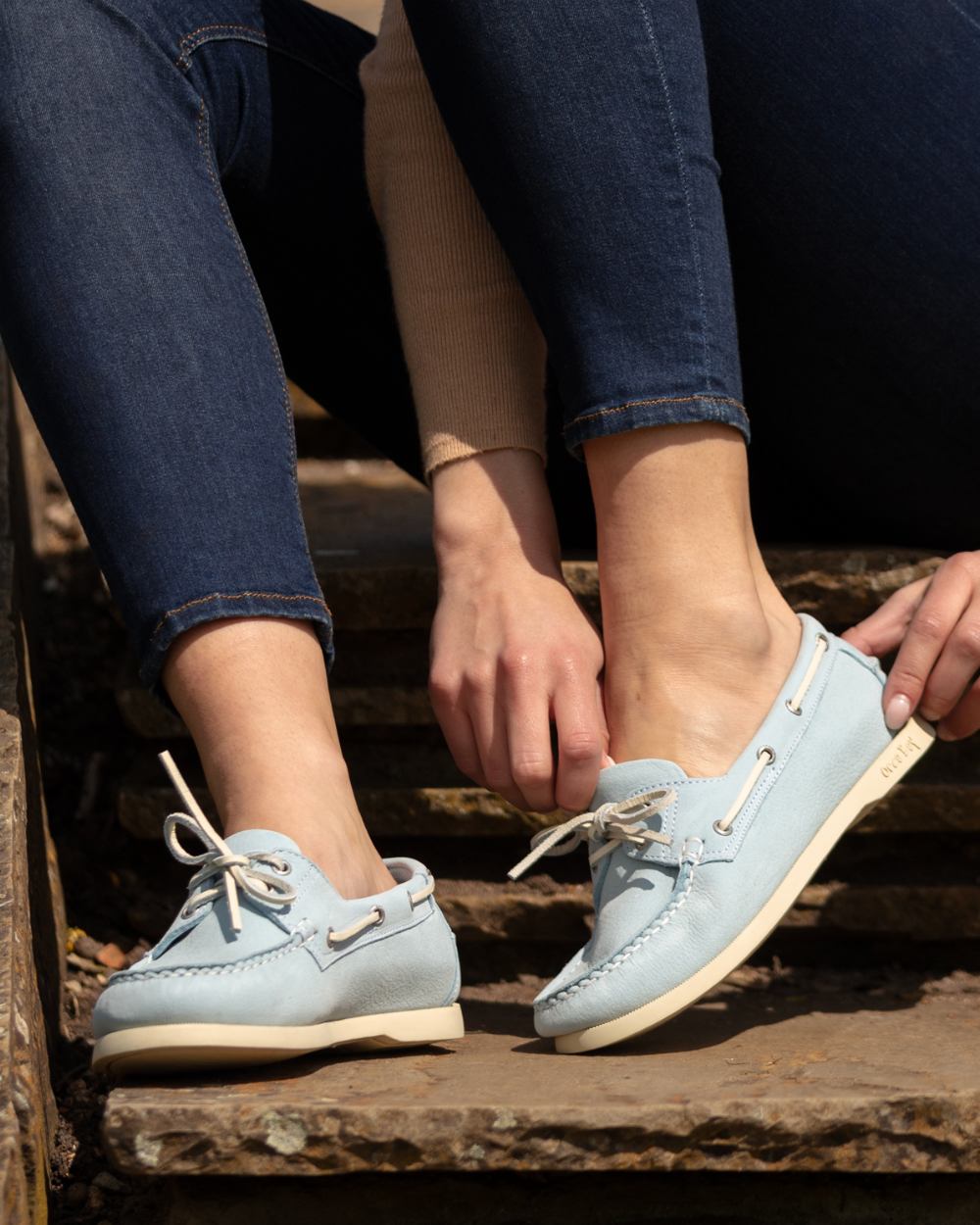 Ice coloured Orca Bay Womens Sandusky Deck Shoes on outdoor background