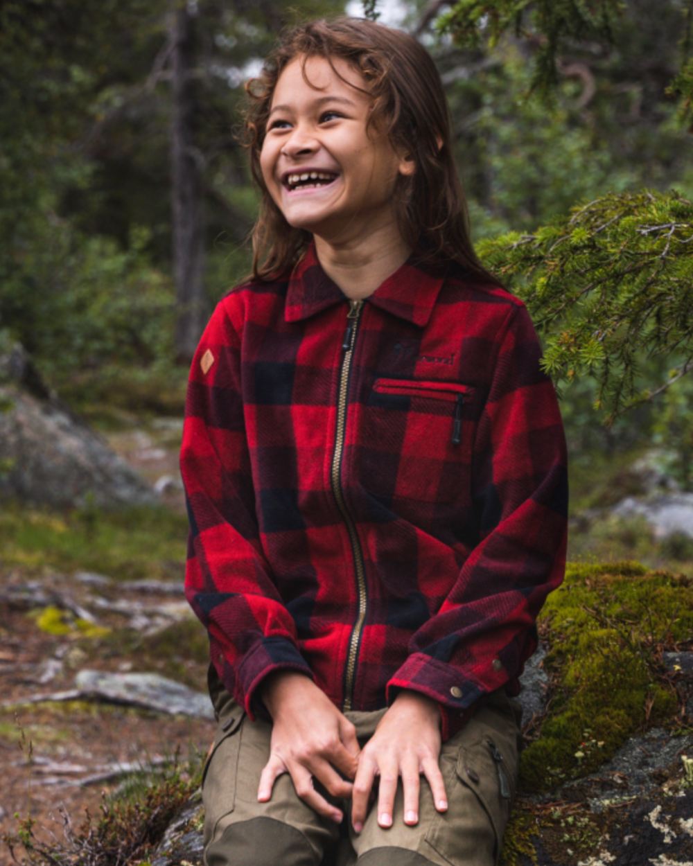 Red Black coloured Pinewood Childrens Canada Fleece Shirt on forest background