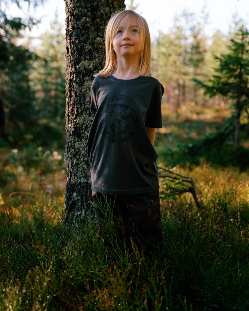 Dusty Plum Jungle coloured Pinewood Childrens Lappland Camou Trousers on forest background