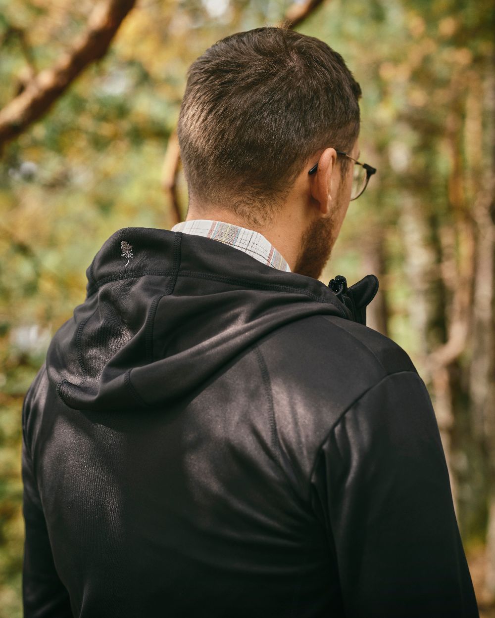 Black Coloured Pinewood Finnveden Hoodie on outdoor background