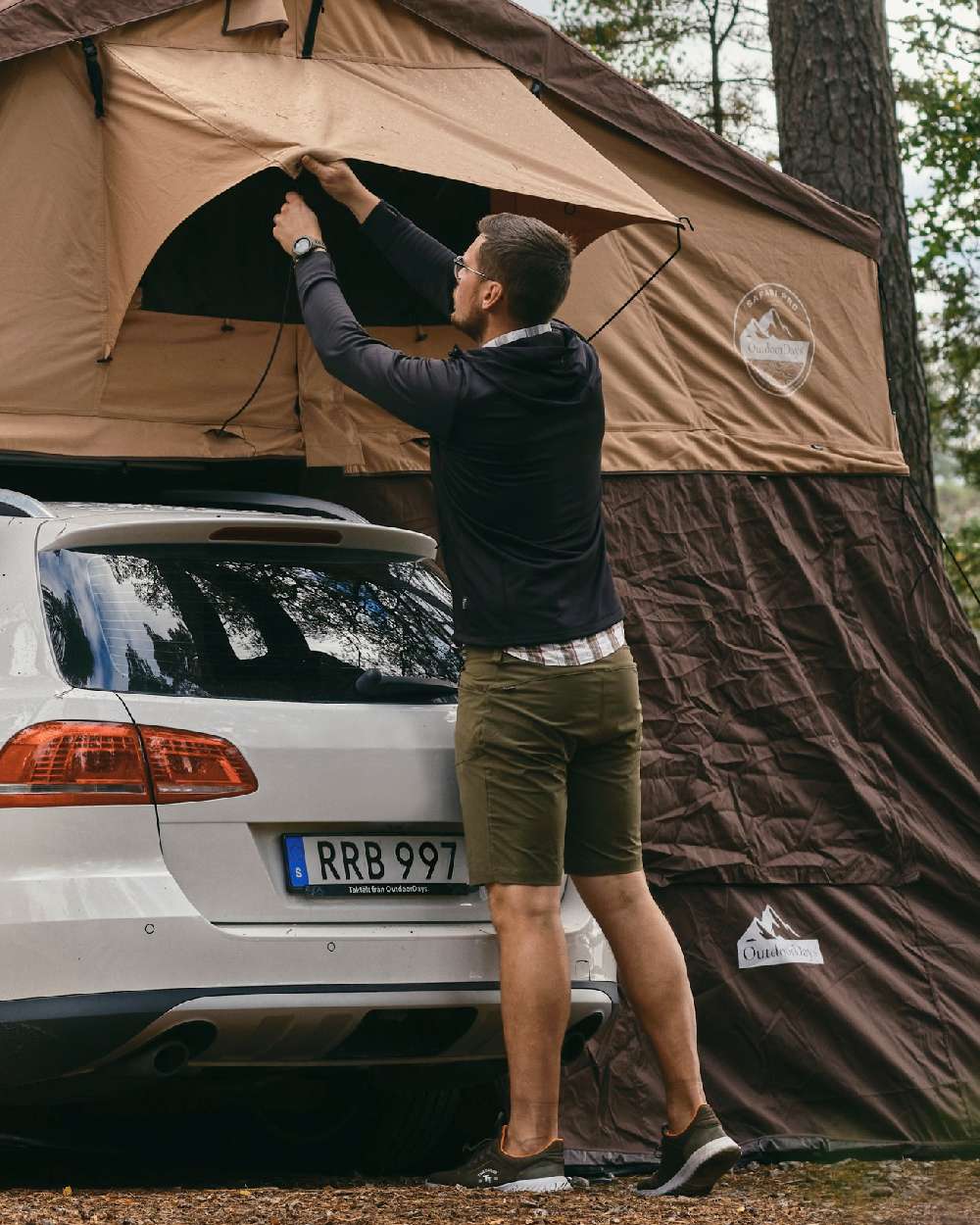 Black Coloured Pinewood Finnveden Hoodie on outdoor background