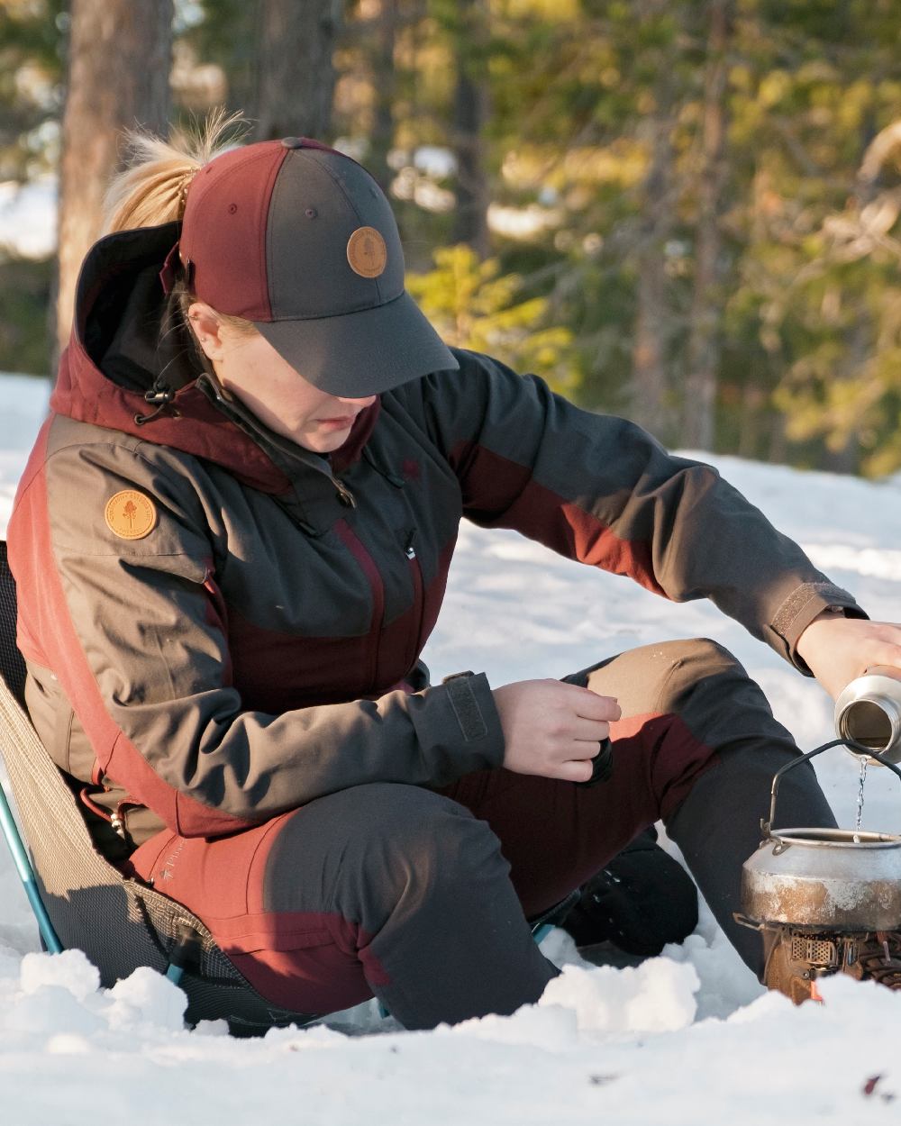 Earth Plum Dark Anthracite Coloured Pinewood Finnveden Hybrid Cap on outdoor background