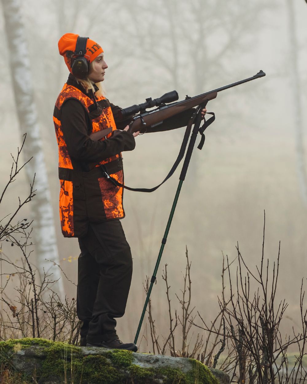 Orange Green Coloured Pinewood Melange Hat on outdoor background